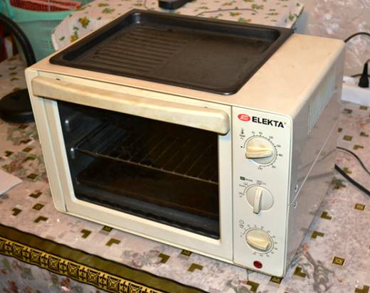 Фотография печки Elekta ebro 586 GS вид спереди и с боку. Фотография печки Elekta ebro 586 GS вид спереди и с боку.