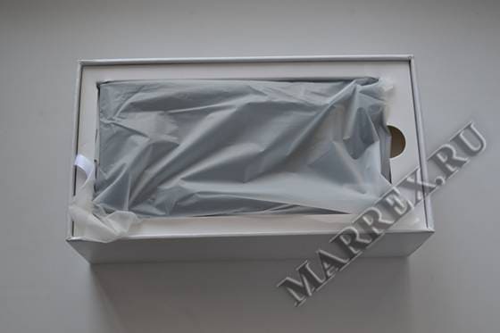 Открытая коробка THL t100s.